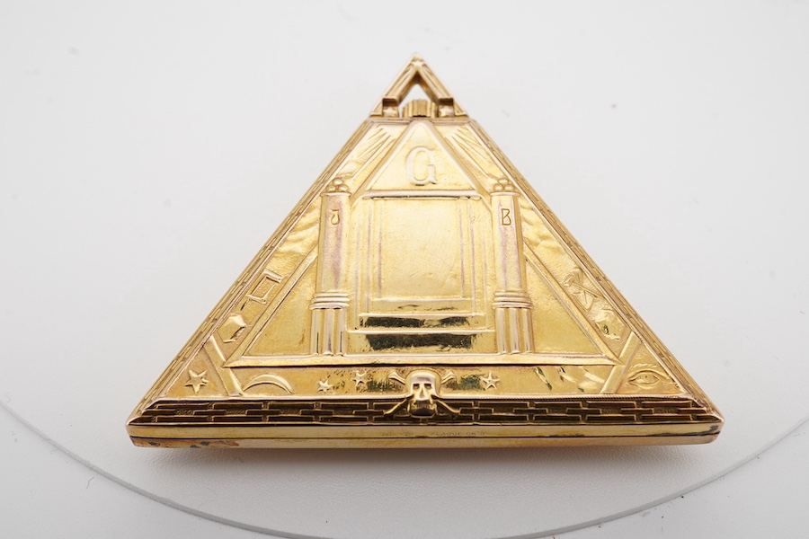 A cased gold plated Minimax Masonic triangular pocket watch, with symbol 'numerals', 48mm by 55mm. Condition - poor to fair